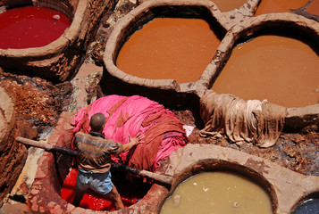 Man Tanning Leather in Fes, Morocco