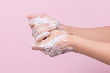 Hygiene to protect human health from viruses, hand washing with soap process.