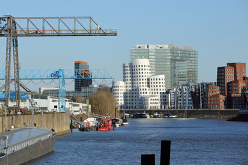 industrial port of Dusseldorf with trendy office buildings in the media harbor business district along the Rhine river