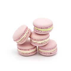 Pink macaroon cake on a white background