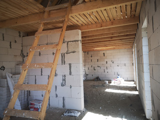 wooden staircase going to the attic