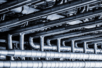 Pipelines.
Blue cyanotype dystopian picture of the pipeline system of a massive building in a futuristic megalopolis.