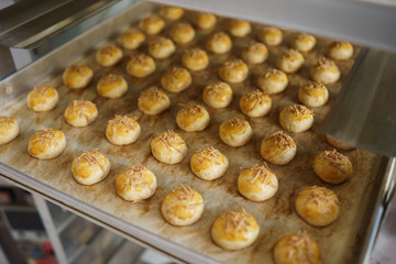 fresh nastar cake from the oven. pineapple jam cake dessert on a tray
