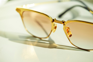 Light color sunglasses close up