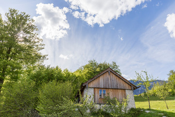 old wooden hut in a rural area