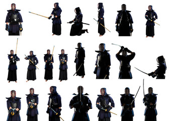 male in tradition kendo armor with shinai (bamboo sword). shot in studio. Isolated with clipping path on white background