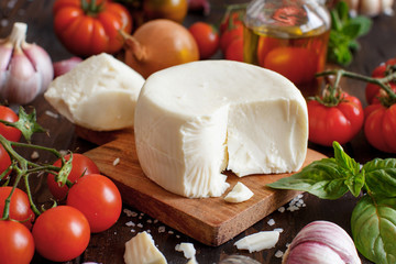 South Italian cheese cacioricotta with vegetables, herbs and olive oil