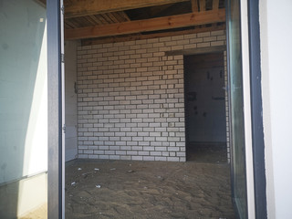 unfinished room with with brick and blocks