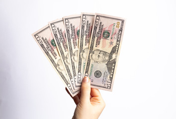 Fifty dollars banknote in hand, cash money to spend right now. Economic crisis as a consequences of...