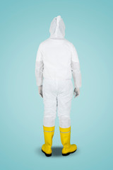 Back view of doctor in hazmat suit in studio