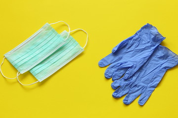 rubber gloves and medical mask, personal protective equipment against coronavirus