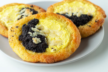 Traditional Czech kolache. Butter baking with cottage cheese and poppy seeds. World cuisine.