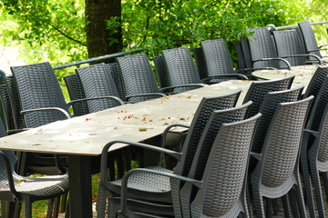 Italian restaurants and bars in Merano, South Tyrol, are still closed because of COVID-19. Chairs and tables stacked up and chained together. No operation. 
