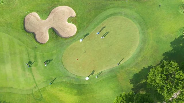 Golf course beautiful aerial top view of golf field landscape with sunrise view in the morning shot. Bangkok Thailand