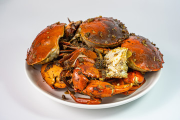 Plate of stir-fried crab with garlic and salt pepper