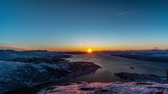 Narvik Sunset in Narvikfjellet, vibrant panning cold windy time lapse into the fjord in northern Norway Narvik Lofoten