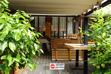 Italian restaurants in Merano, South Tyrol, are still closed because of COVID-19. Chairs and tables...