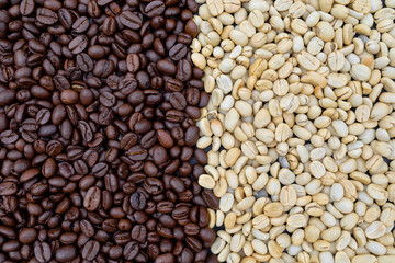 cup of coffee and bean on black wooden table background. top view