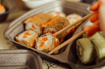 sushi with chopsticks
