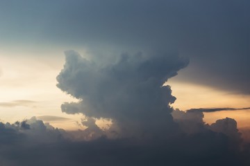 Big gray cloud on evening sky background