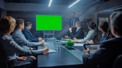 Late at Night In the Corporate Meeting Room: Director Talks and Uses Digital Chroma Key Interactive...