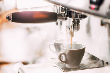 Making coffee in the coffee machine. Fresh espresso.
