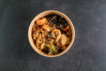 Asian noodles with meat in box