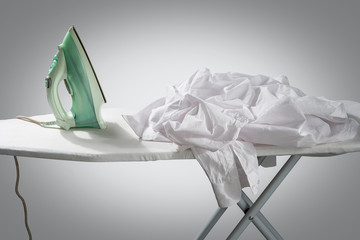 
Iron on an ironing board.