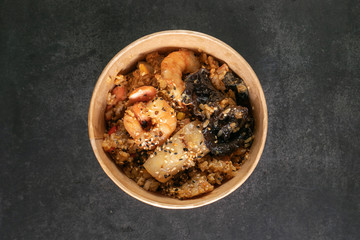 shrimp tahan fried Japanese rice with vegetables and slices of beef in box