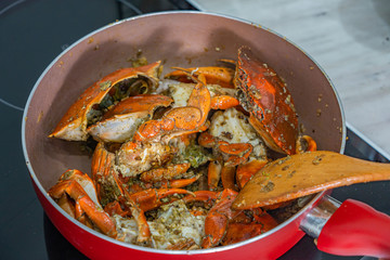 Fresh-cooked stir-fried crab with salt pepper and garlic