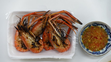 roast shrimp on white dish, seafood