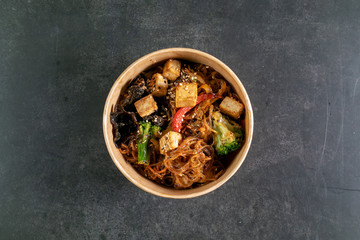 Asian noodles with meat in box