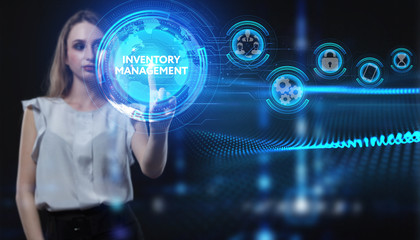 Business, Technology, Internet and network concept. Young businessman working on a virtual screen of the future and sees the inscription: Inventory management