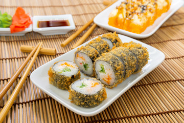 Japanese food restaurant delivery - tempura sushi rolls. Sushi rolls