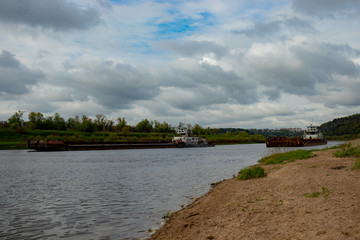 The large navigable river Oka in Russia in the spring on a sunny day, a beautiful river landscape...