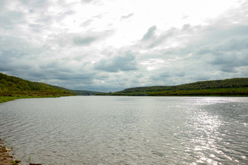 The large navigable river Oka in Russia in the spring on a sunny day, a beautiful river landscape.