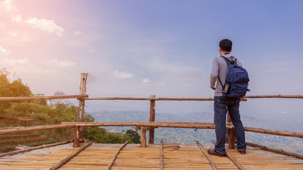 Naklejka premium A man standing at the view of Mon Jam, Mae Riem, tourist attraction, Chiang Mai province, Thailand