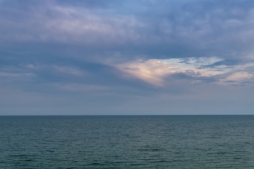 Relaxing seascape with wide horizon of the sky and the sea