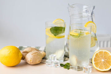 Two glasses of ginger lemonade on the table, useful for immunity ginger lemonade
