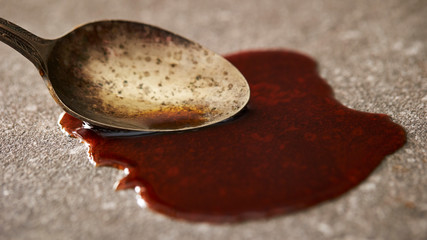 Soy sauce with rusty spoon