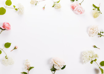 Fototapeta na wymiar Festive flower composition on the white background. Overhead view