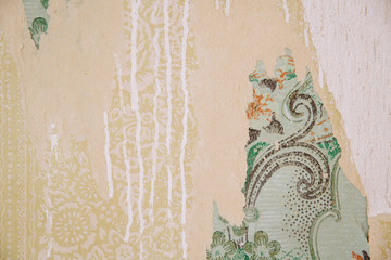 Vintage, old wallpaper, dripping paint, layers of different colorful paper backgrounds.