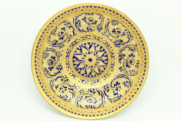 Benjarong Plate on white background, souvenir from Thailand.