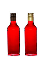 Two bottles with pink wine wih black and golden caps isolated on white