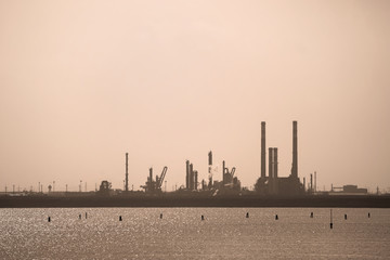 Fototapeta na wymiar petrochemical plant silhouette, industrial scene in Porto Marghera (Venice - Italy) storage and treatment of toxic waste in one of the most polluted areas of the North East 