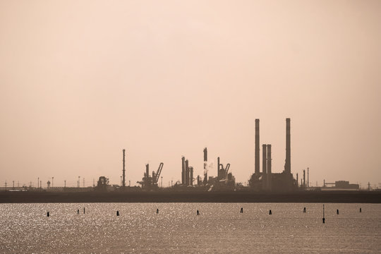 petrochemical plant silhouette, industrial scene in Porto Marghera (Venice - Italy) storage and treatment of toxic waste in one of the most polluted areas of the North East

