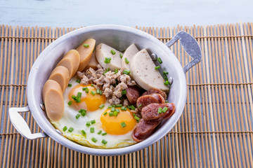 Eggs pan with sausage