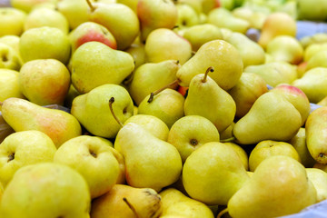 Pears harvest background on shelves in supermarket may use as background close up