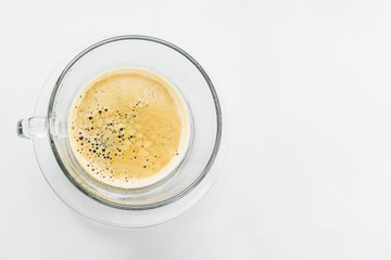 Full cup of fresh espresso, view from above. Cup of fresh espresso in glass cup on white background. coffee break with latte and cappuccino. coffee drink with copy space with top view for coffee shop