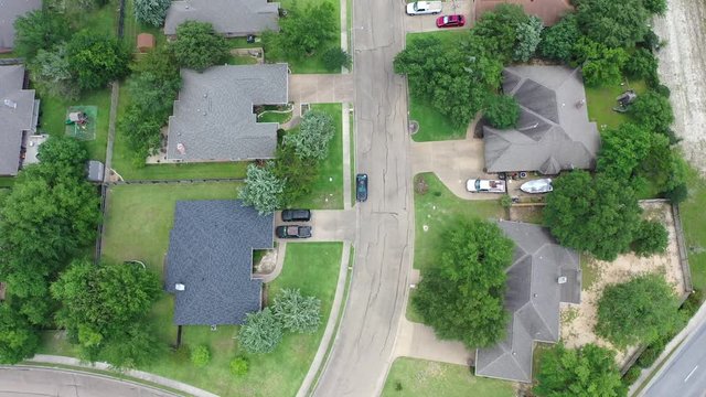Downward looking slow flight over a residential street, Bryan, Texas